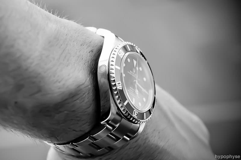 A Rolex Sea-Dweller worn on a wrist.